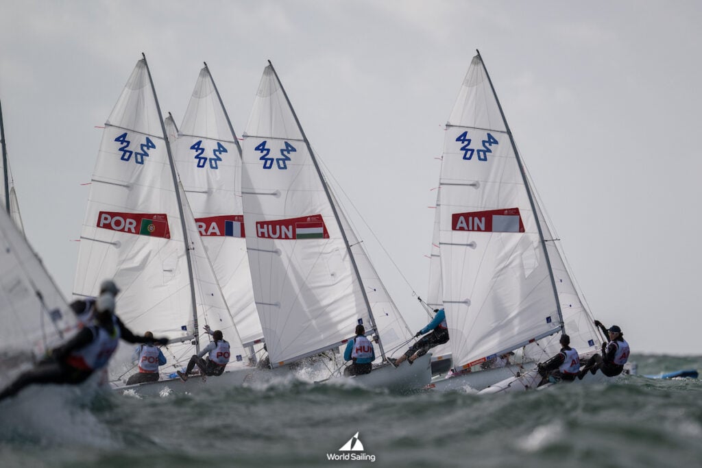 
(Day 1) 2025 Youth Sailing World Championships -  Vilamoura, Portugal.
Taking place at Marina de Vilamoura, in Loulé, Portugal, from 12–20 December 2025, over 400 sailors of the world’s best young sailors aged 12 to 18 from up to 70 countries will compete across a total of 11 events in male, female, and mixed categories.
